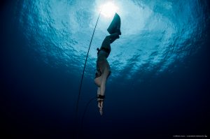 Freediving sport. Monofin. Freefalling